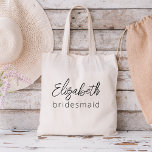 Bridesmaid Modern Minimalist Script Bachelorette Tote Bag<br><div class="desc">Verhoog je vrijgezellenfeest met ons "Bridesmaid Modern Minimalist Script" collectie. Deze prachtige lijn van producten belichaamt eigentijdse elegantie en tijdloze stijl, perfect voor het vieren van uw aankomende huwelijken op een moderne en verfijnde manier. Ons minimalistische scriptontwerp plaatst uw bruidsmeisjes op de voorgrond en voegt een vleugje klasse toe aan...</div>