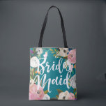 Bridesmaids Floral Wedding Party Tote Bag<br><div class="desc">Aangepaste kleur achtergrond en all over afdrukken met geschilderde bloemranden. Bruidsmeisje in penseelscript aan de ene kant en naam op de achterkant. Aanpassen om de achtergrondkleur te wijzigen (turquoise). Zwart ziet er ook geweldig uit. De prachtig geschilderde bloemstukken zijn van Creëer the Cut. Vind ze op Creative Market https://crmrkt.com/7WdAX, Etsy...</div>