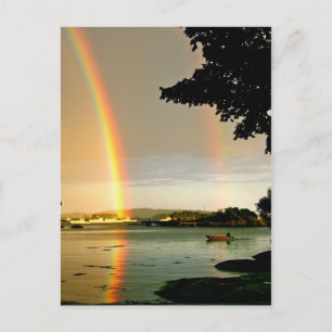 Briefkaart dubbele regenboog boven water