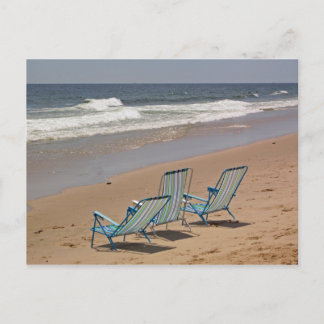 Briefkaart met drie leerstoelen