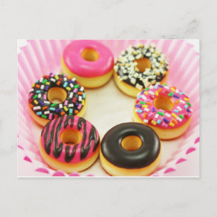 Briefkaart van kleurrijke donuts