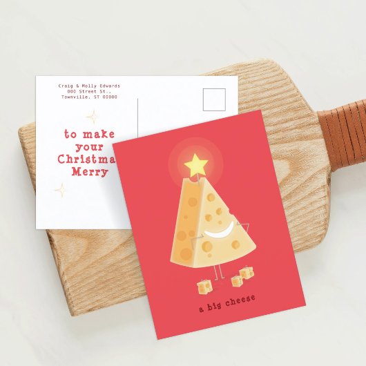 Briefkaart voor kerstmis met een grote kaas