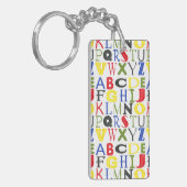 Brigadekleurige brieven van Megan Meagher Sleutelhanger (Voorkant Links)