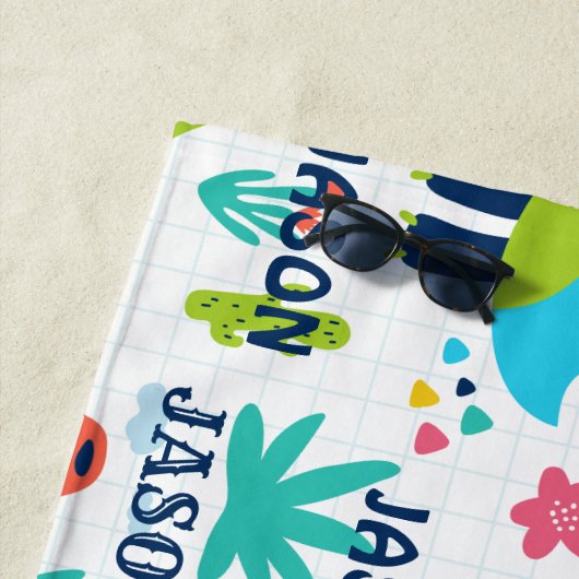 Bright dinosauruspatroon met aangepaste naam strandlaken (In situ)