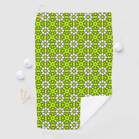 Bright green and white floral patterned golfhanddoek (Insitu)