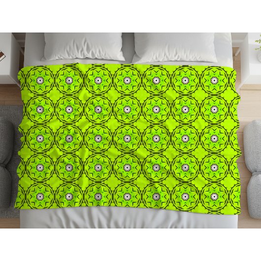 Bright green towel with intricate circular pattern fleece deken