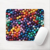 BRIGHTLY COLORED PLASTIC BEADS MUISMAT (Met muis)