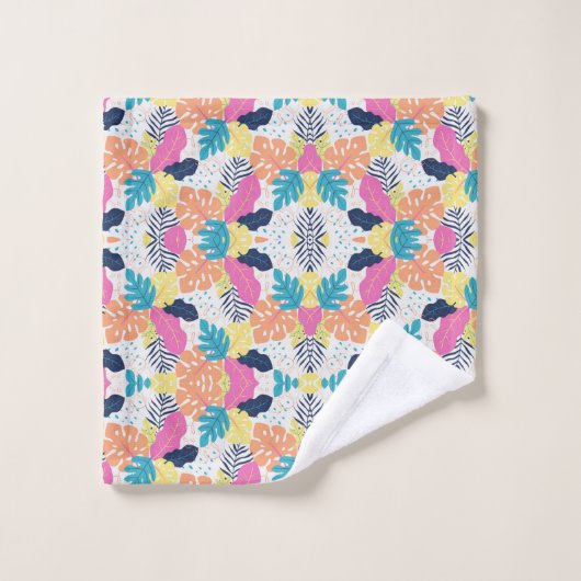 Brightly patterned towels and a washcloth  bad handdoek (Wasdoekje)