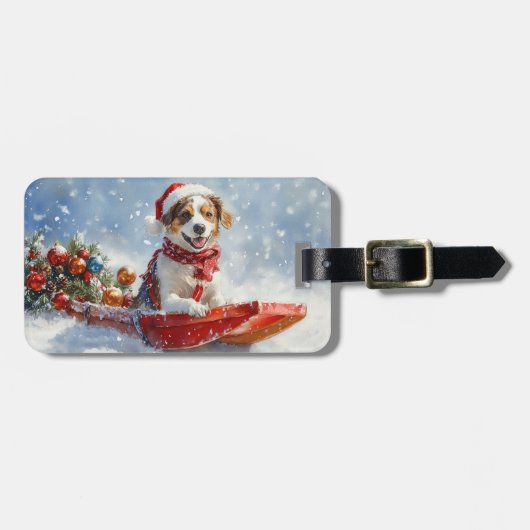 Brittany Spaniel-hond in slee Kerstmis Bagagelabel (Voorkant horizontaal)