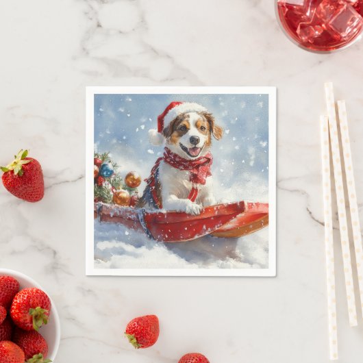 Brittany Spaniel-hond in slee Kerstmis Servet (Insitu)