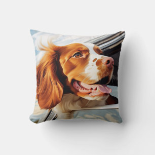 Brittany spaniel in autoruit kussen