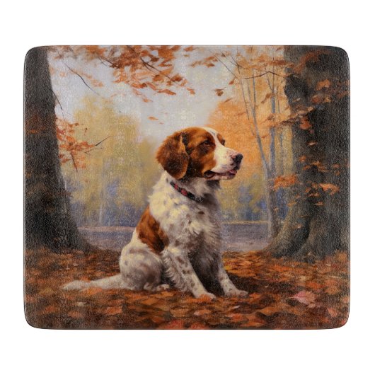 Brittany Spaniel in herfstbladeren val inspireert Snijplank (Voorkant)