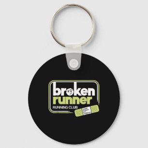 Broken Runner Running Club verandert tegenslagen i Sleutelhanger