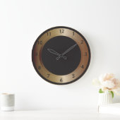 Brons- en zwarte wandklok (Huis)