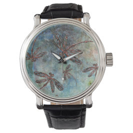 Bronze Tipped Dragonflies op een Magic Sky. Horloge