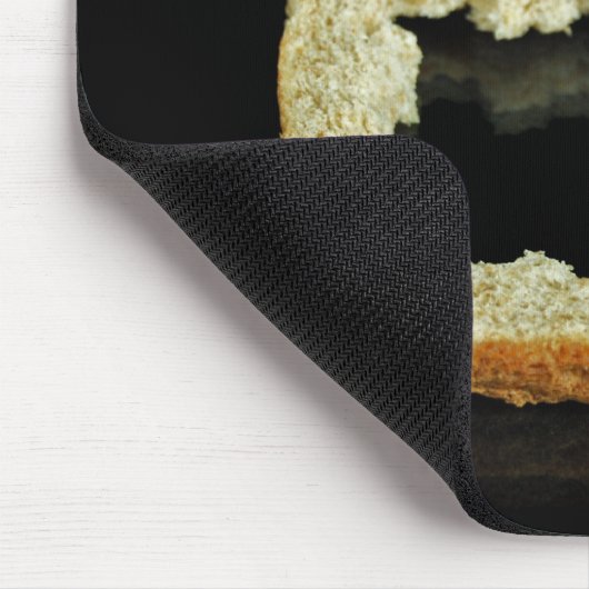 Brood crust op zwart muismat (Hoek)