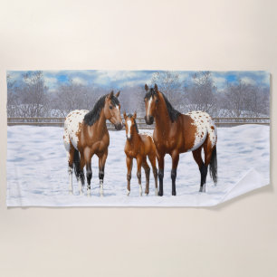 Brown Bay Appaloosa-paarden in sneeuw Strandlaken