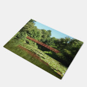 Brug bij het meer van het honderdjarig bestaan in deurmat (Schuin)