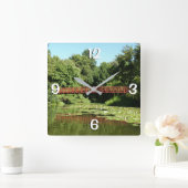 Brug bij het meer van het honderdjarig bestaan in  vierkante klok (Huis)