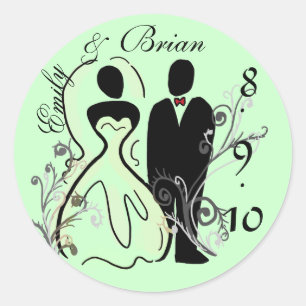 Bruid en bruidegom slaan de datum stickers