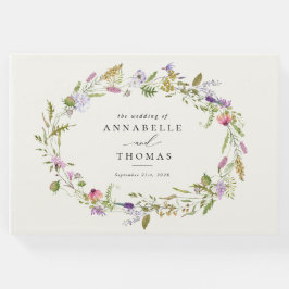 Bruidsboeket van wilde bloemen en groen gastenboek