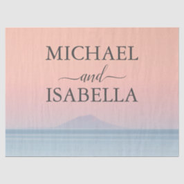 Bruiloft door het zee onder peachy sky zonsonderga tissuepapier