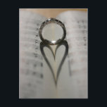 Bruiloft Ring Hart Schaduw Briefkaart<br><div class="desc">Trouwring schaduw van een hart,  op een muziekboek. Perfect als een RSVP-insert. Overeenkomende postzegels en wenskaarten beschikbaar. Aanpassen voor het evenement.</div>
