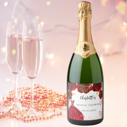 Bruiloftsfeest rode witte jurk bloemen sparkling wijnetiket