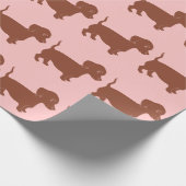 Bruin dachshunds lichtroze omslagpapier cadeaupapier (Hoek)