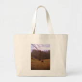 Bruin en blond paard in een veld grote tote bag (Voorkant)