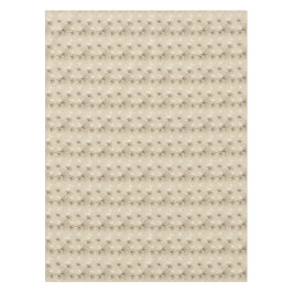 Bruin en wit ginko-bladeren op tan tafelkleed