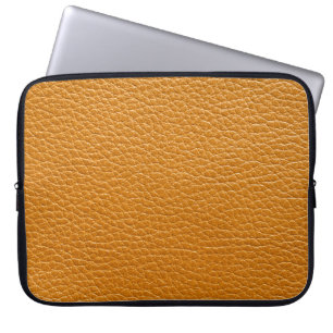 Bruin leer, close-up textuur achtergrond. laptop sleeve