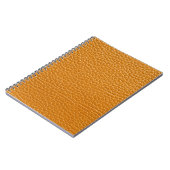 Bruin leer, close-up textuur achtergrond. notitieboek (Linkerzijde)