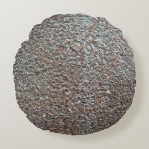 Bruin metaal corrosiepatroon rond kussen