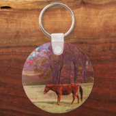 Bruin paard in een grasveld sleutelhanger (Voorkant)