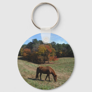 Bruin paard met herfst sleutelhanger
