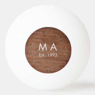 Bruin rustieke baksteen voeg naam letter jaardatum pingpongbal