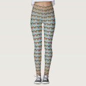 Bruin Sinaasappel Monarch Vlinders op licht Blauw Leggings (Voorkant)