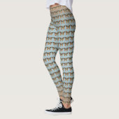 Bruin Sinaasappel Monarch Vlinders op licht Blauw Leggings (Links)