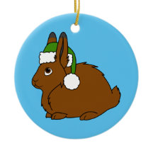 Bruine Arctische haas met kerstgroene kerstmanshat