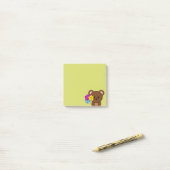 Bruine Beer Met Een Bos Bloemen Post-it® Notes (Op bureau)