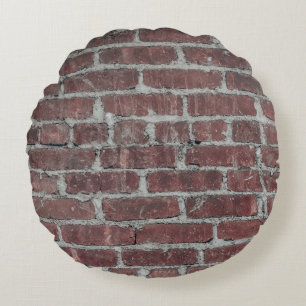 Bruine betonwand rond kussen