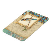 Bruine en blauwe vogel op een bijkantoor die omhoo magneet (Linkerzijde)