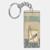 Bruine en blauwe vogel op een bijkantoor die omhoo sleutelhanger (Voorkant Links)