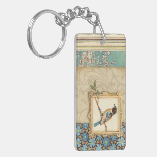 Bruine en blauwe vogel op een bijkantoor die omhoo sleutelhanger (Voorkant Links)