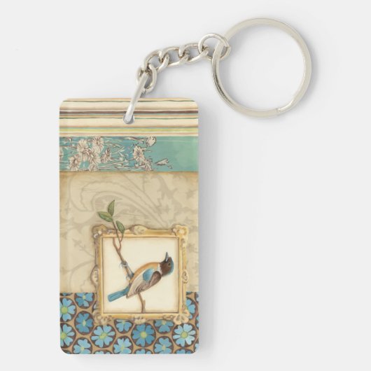 Bruine en blauwe vogel op een bijkantoor die omhoo sleutelhanger (achterkant)