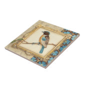 Bruine en blauwe vogel op een bijkantoor die omhoo tegeltje (Zijkant)