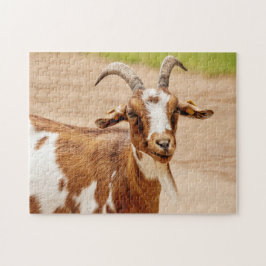 Bruine en witte geit legpuzzel