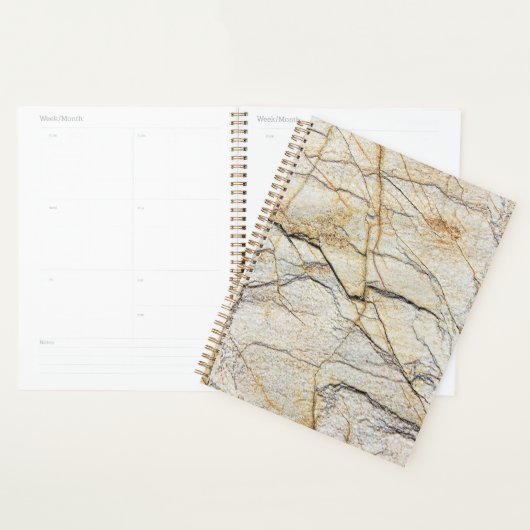 Bruine en zwarte gestructureerde marmeren steen planner (Display)