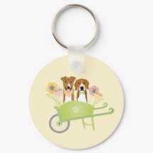 Bruine honden in wielbarroenbloemen